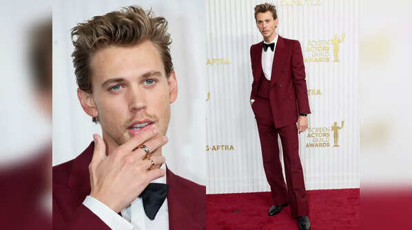 His tailored burgundy tuxedo