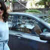 Article image for: Sunny Leone matches outfit with car’s colour, involves in a <i class="tbold">fun banter</i> with paparazzi