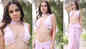 'Pehli bar poore kapde': Urfi Javed sizzles in a pink saree with plunging neckline bralette blouse