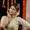 Article image for: In a <i class="tbold">traditional wear</i>