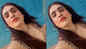 Nehhaa Malik chills at the poolside in Malaysia, donning a deep-neck animal print outfit; fan calls her 'Beauty queen'