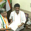 Karnataka Congress president DK Shivakumar gives the 'B' form to Jagadish Shettar, ahead of his nomination filing for polls