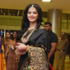 Article image for: <i class="tbold">black saree</i>