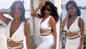 'Apna bana le' says Kate Sharma as she woos fans in a white cutout dress with plunging neckline