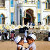 Article image for: Children greet each other after offering Eid prayers at Vizhinjam <i class="tbold">juma</i> Masjid in Kerala.