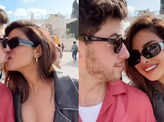 Priyanka Chopra and Nick Jonas share a kiss in front of the Colosseum in Rome