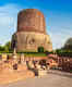 What makes Dhamek Stupa in Varanasi special in Buddhism?