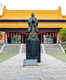 Relax under centuries old cypress trees at Confucius Temple