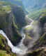 Watch this magnificent waterfall in Norway from a bridge above it