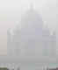 Iconic Taj Mahal disappears behind a blanket of thick smog after Diwali