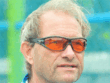 Oltmans complains about lack of chairs, TV sets in Olympic Village