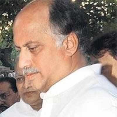 Kamat challenges Patil to prove charges against him