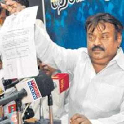 Let's see your assets Vijayakanth tells Karunanidhi