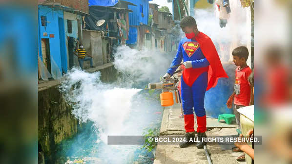 In photos: 'Superman' fumigates the bylanes of Dharavi
