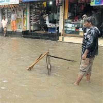Rain floods city with woes