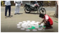 Artists paint graffiti on road to create awareness about COVID-19 in WB’s Asansol 