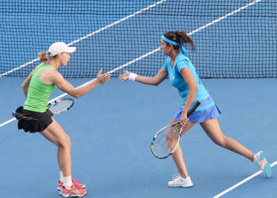Sania crashes out of women's doubles