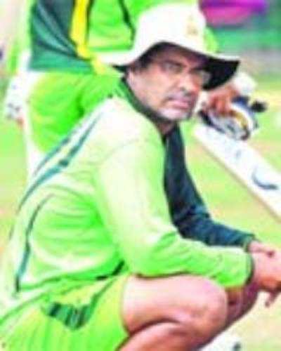 Waqar to step down as coach