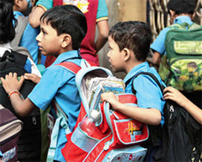 Tawde visits Parle school, finds kids carry up to 6kg