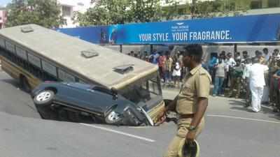 Chennai road caves in, bus, car trapped in the massive crater