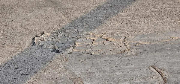 Bridge’s concrete surface comes off after ‘negligent’ use of crane