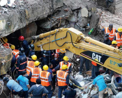 Toll rises to 54, anxious relatives throng rubble looking for loved ones