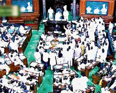 Oppn furore disrupts House, Rahul joins protesting MPs
