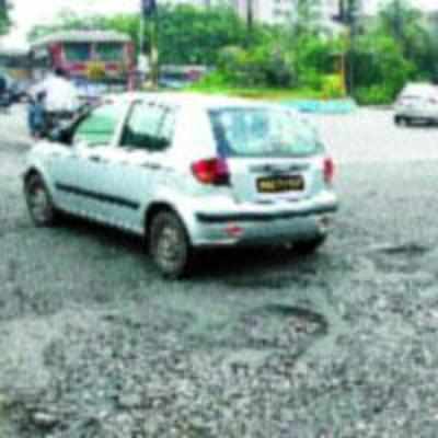 Pothole-ridden road near Arenja corner circle inconveniences motorists