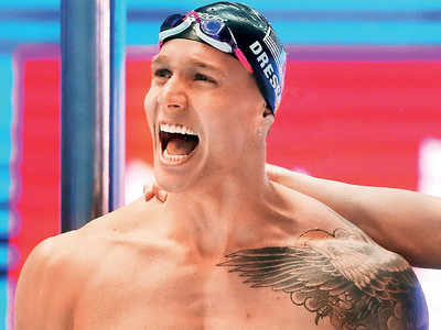 It's a golden hat-trick for Caeleb Dressel at World Swimming Championship