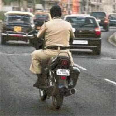 Banned for two-wheelers, but cops allowed to ride?