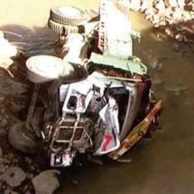 Six dead, 12 injured as truck swerves off bridge