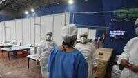 Delhi: Health workers during preparation work at CWG Village Covid-19 centre amid Unlock 2.0 near Akshardham 