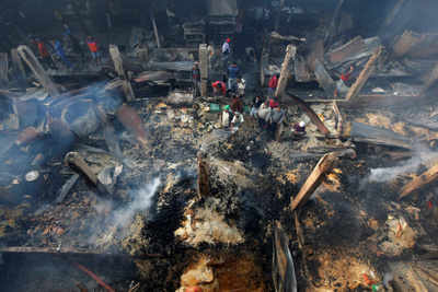 Kolkata: Dumdum cantonment fire claims two lives, 150 shops gutted, search for bodies on