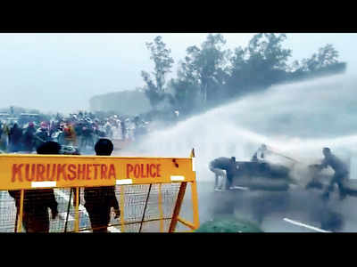 In biting cold, cops use water cannons on farmers to foil ‘Delhi chalo’ march
