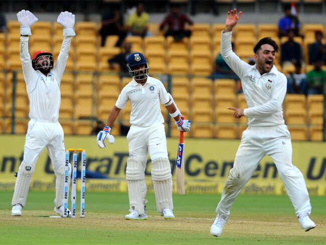 Afghanistan fight back after Dhawan, Vijay tons get India going