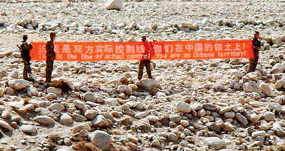 After promises of peace, China builds 5-km road crossing LAC