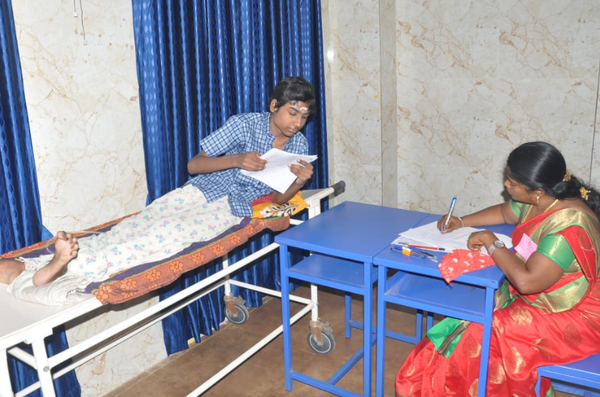 Bed-ridden by accident, TN schoolboy writes board exam lying on stretcher