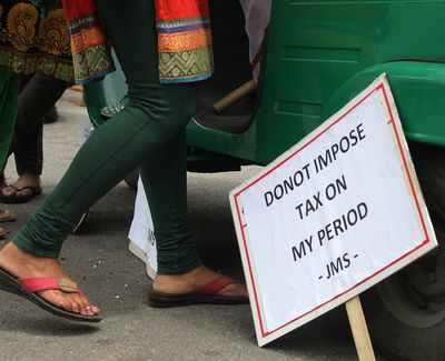 Students pen messages on sanitary napkins for Prime Minister Narendra Modi