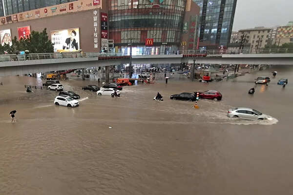 ‘Please Save Us!’ Grim scenes in China as flood inundates a subway
