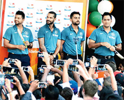 Say Cheese! Smiles are back on the faces of MS Dhoni & Co.