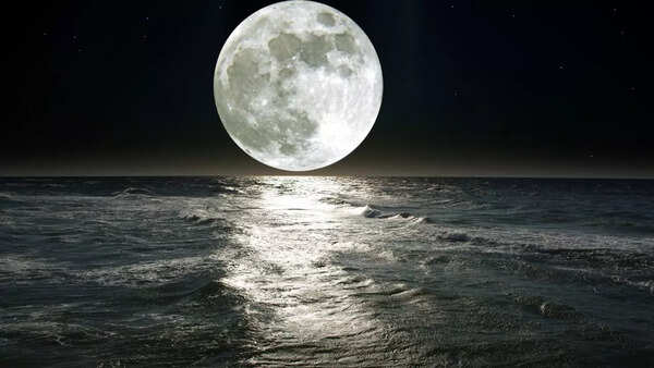 Why is moon connected to feminine energy?