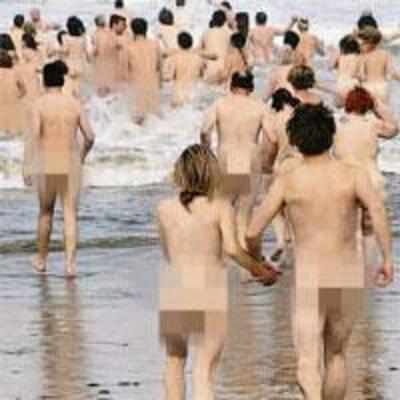 Nude world record as 400 people splash in icy sea