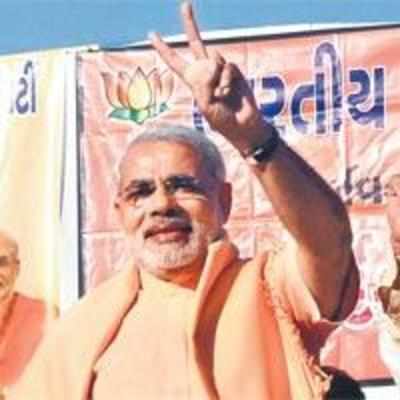 Modi bows to party; lands in Delhi to discuss Gujarat Cabinet