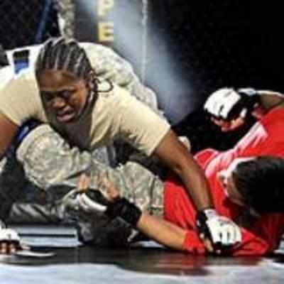 Female US soldiers take on male cage fighters