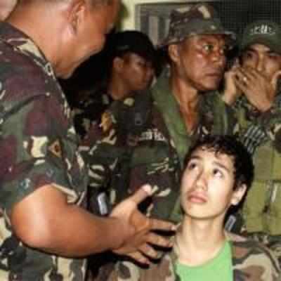 Abducted boy escapes militants in Philippines, reunited with family