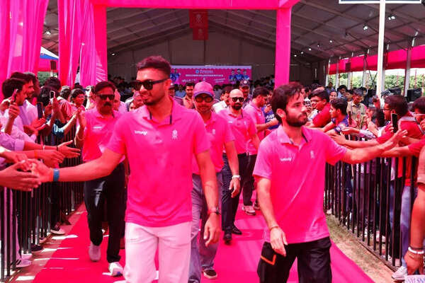 Rajasthan Royals players and coach interact with students in Jaipur
