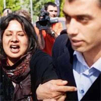 Woman who said Gaddafi's men raped her is '˜freed'