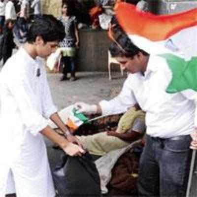 Students gather strewn flags, preserve pride of the tricolour