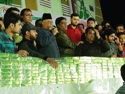 Hyderabad: MIM leader throws 1,000 kg sweets at voters to celebrate victory in elections