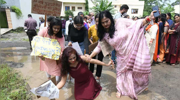 Photos: Women catwalk on potholed Bhopal road